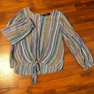 Bell sleeve, tie front, jean color stripped too.